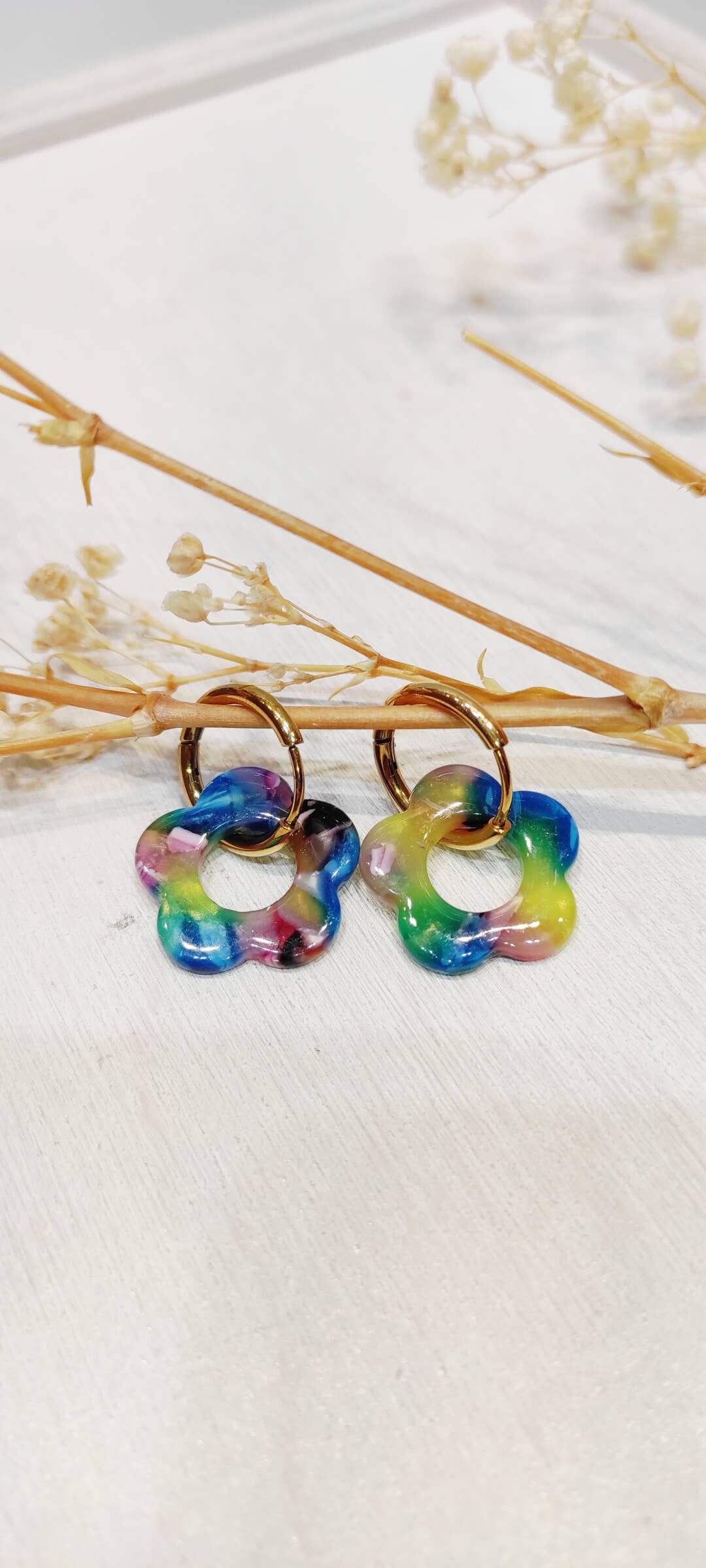 Boucle d'oreille fleur à motifs