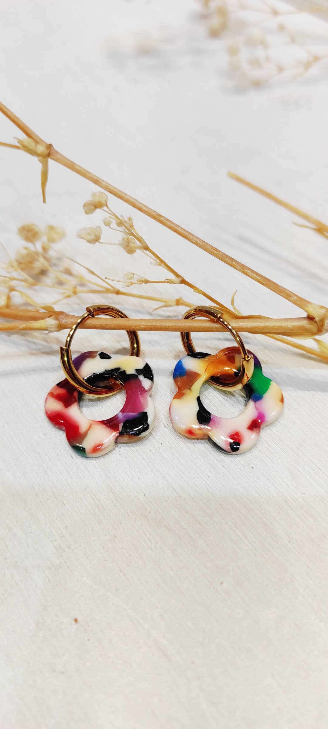 Boucle d'oreille fleur à motifs