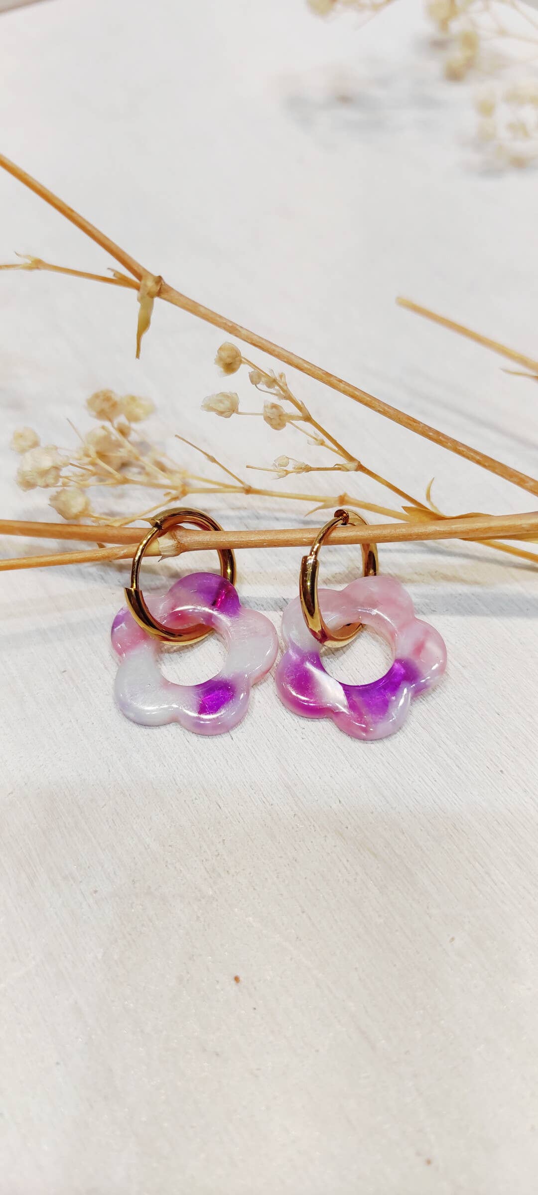 Boucle d'oreille fleur à motifs