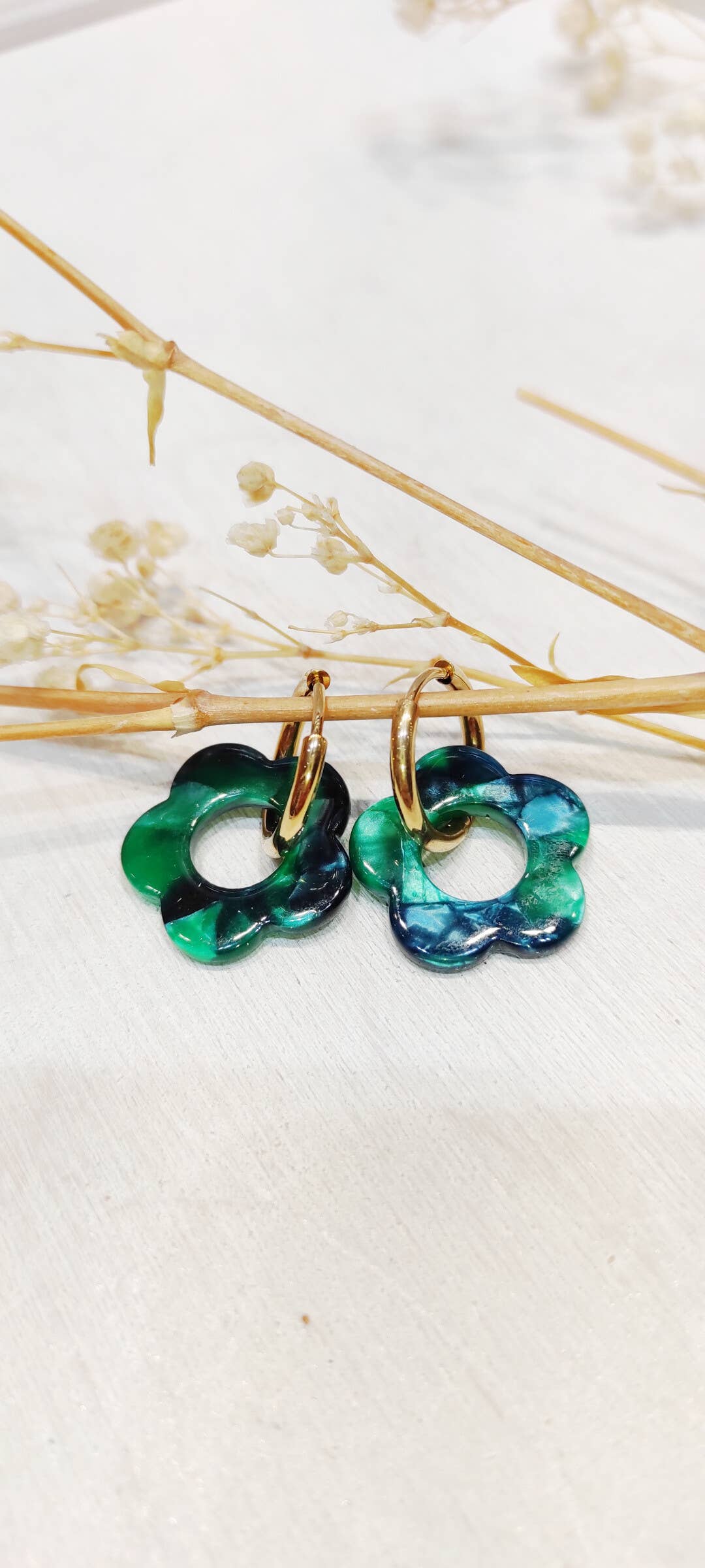 Boucle d'oreille fleur à motifs