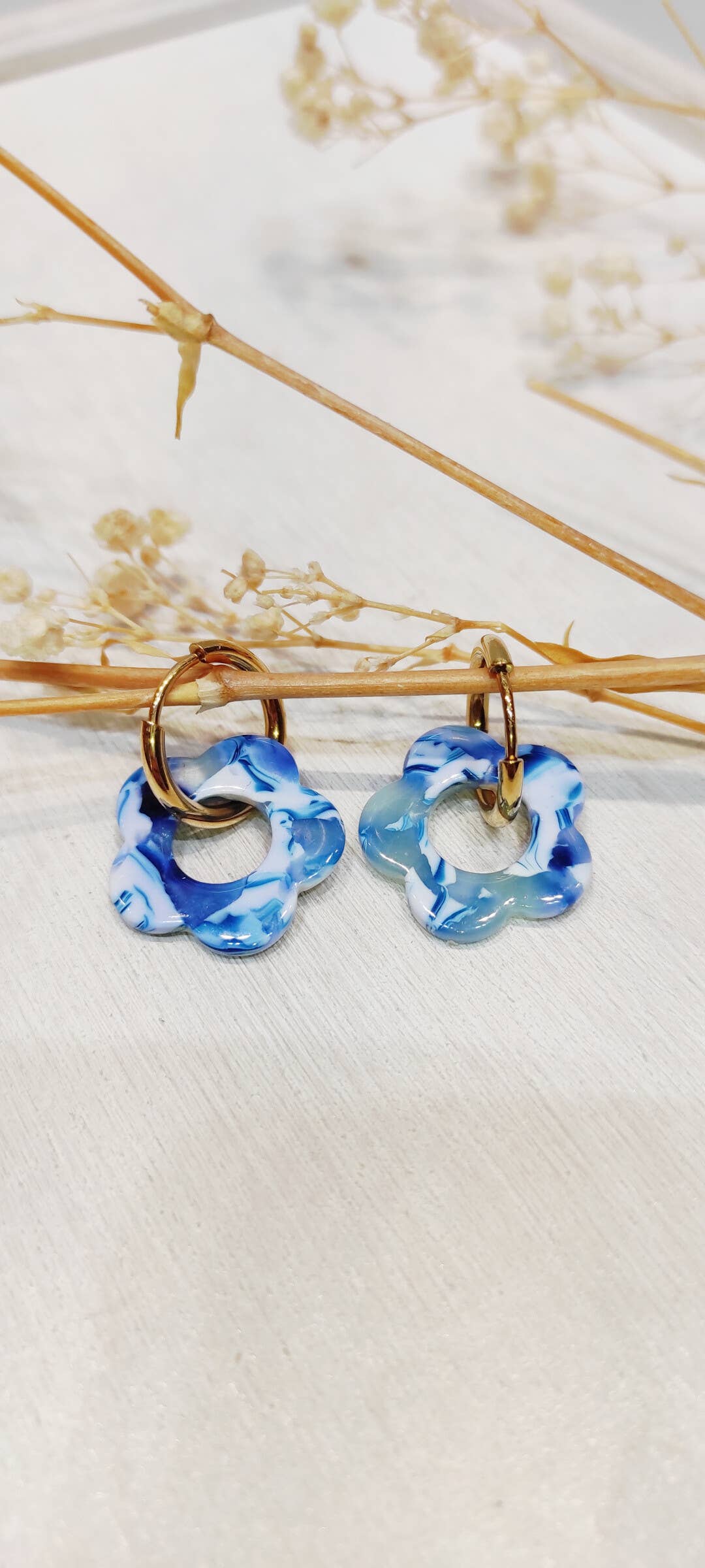 Boucle d'oreille fleur à motifs