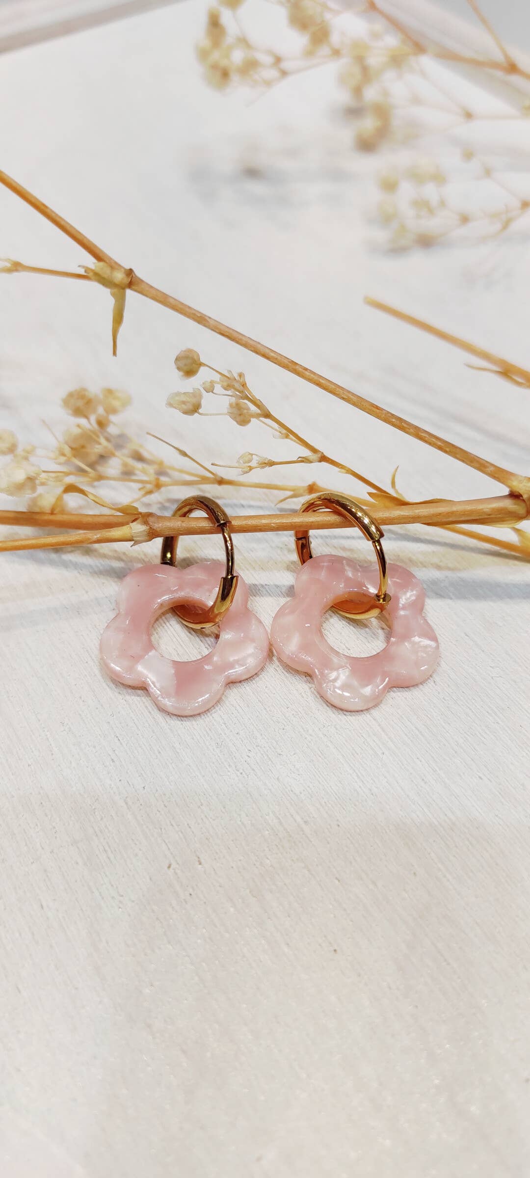 Boucle d'oreille fleur à motifs