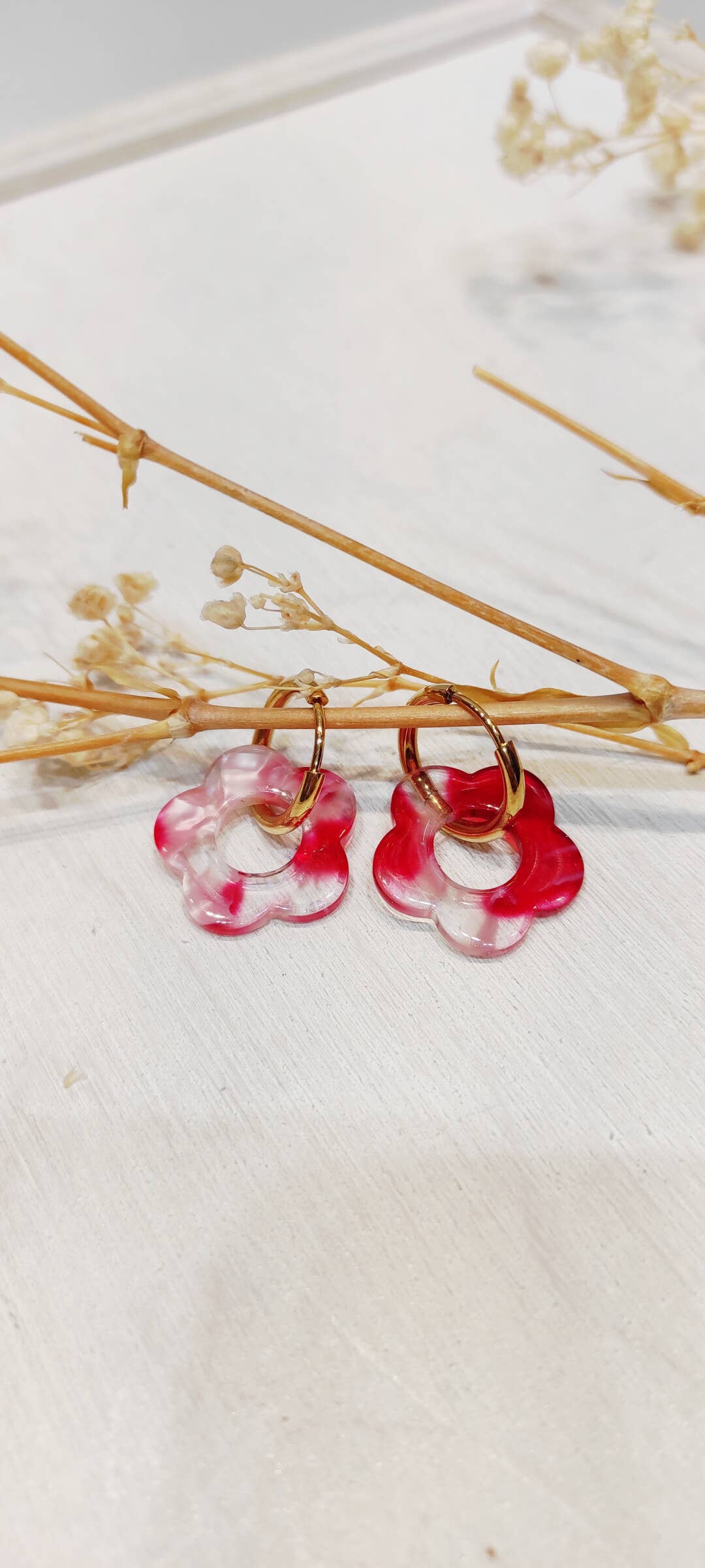 Boucle d'oreille fleur à motifs